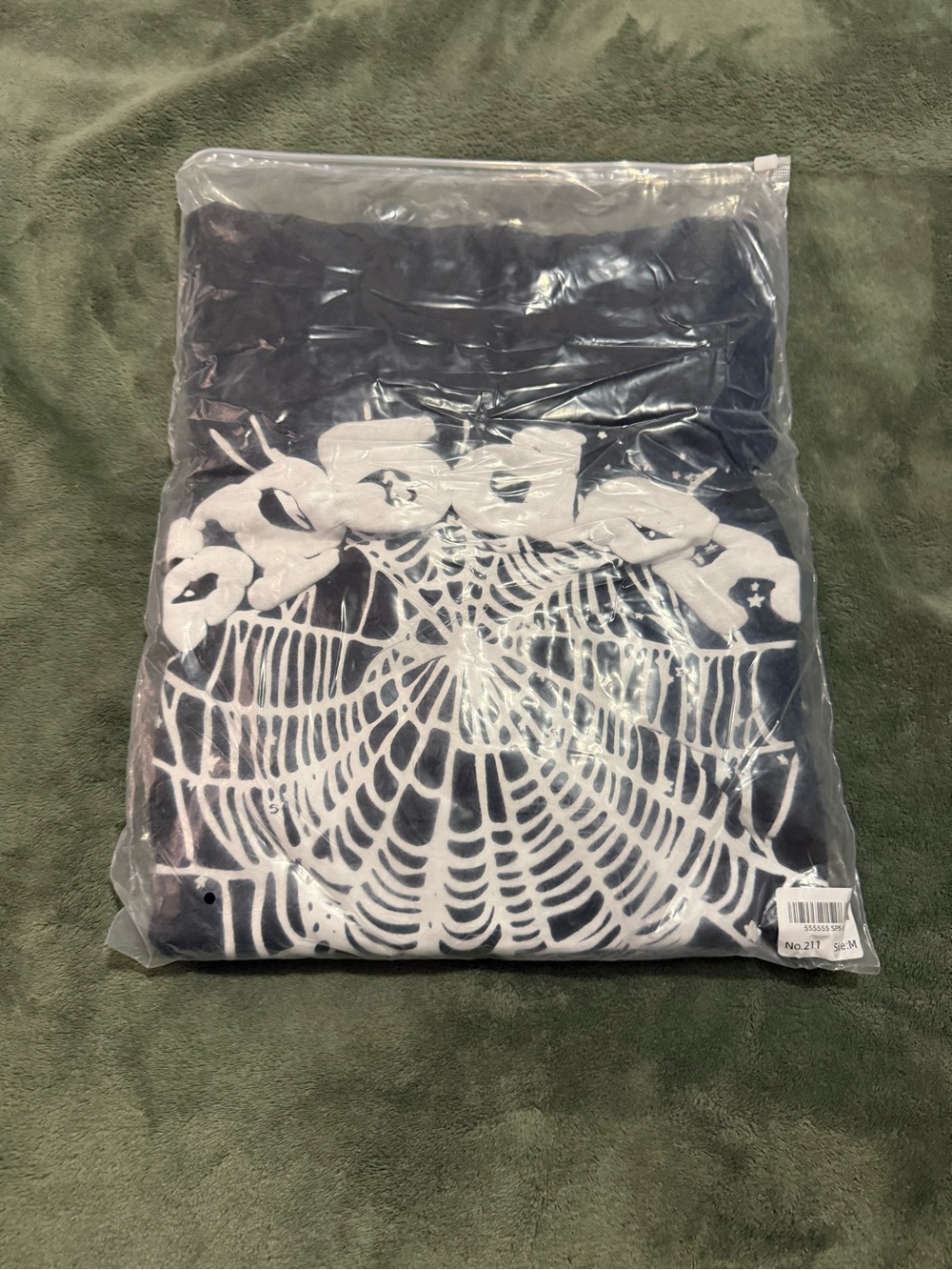 OG black Sp5der hoodie colors White/black unused with its own bag size medium.